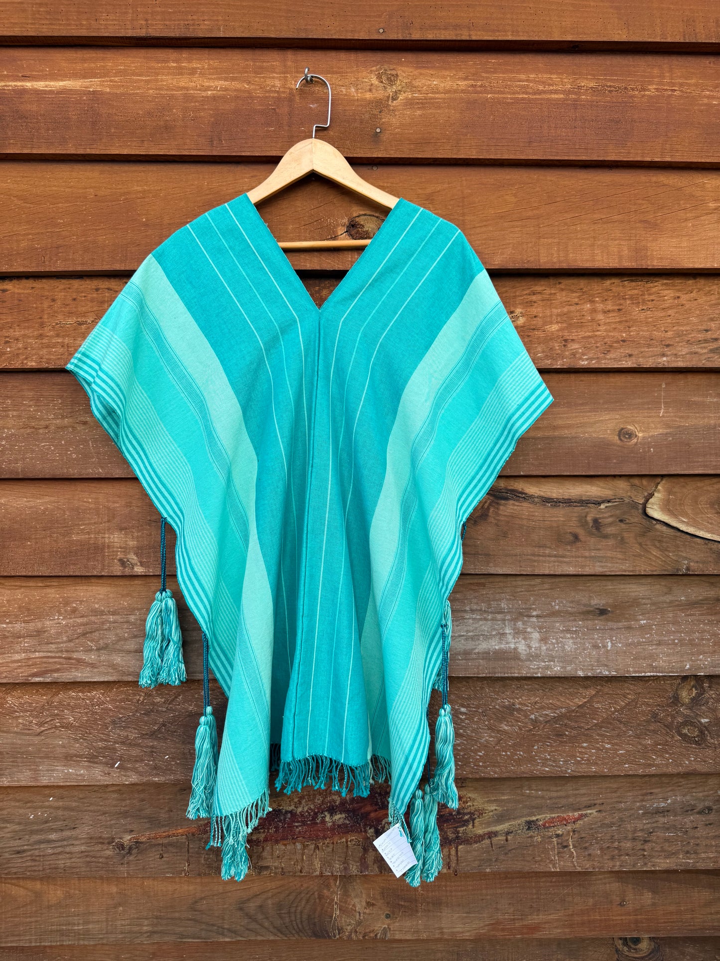 Poncho hecho en telar de cintura celeste