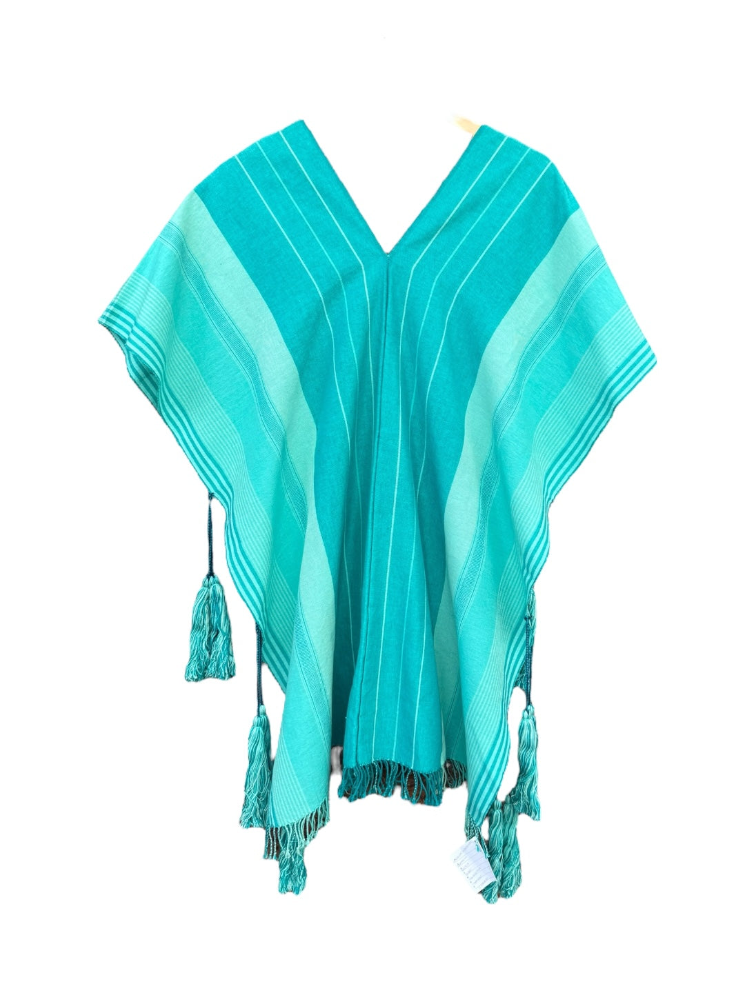 Poncho hecho en telar de cintura celeste